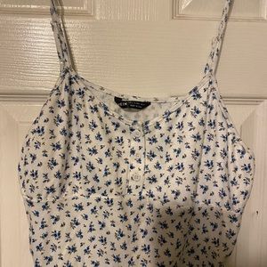 Shein women’s size Large spaghetti strap crop top. White with blue flowers